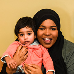 Teacher with child on her lap